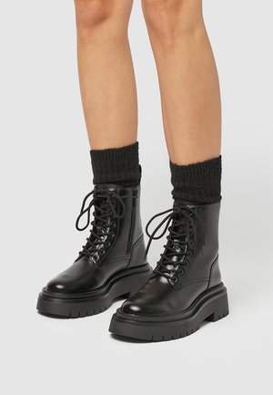 Botines con cordones - black