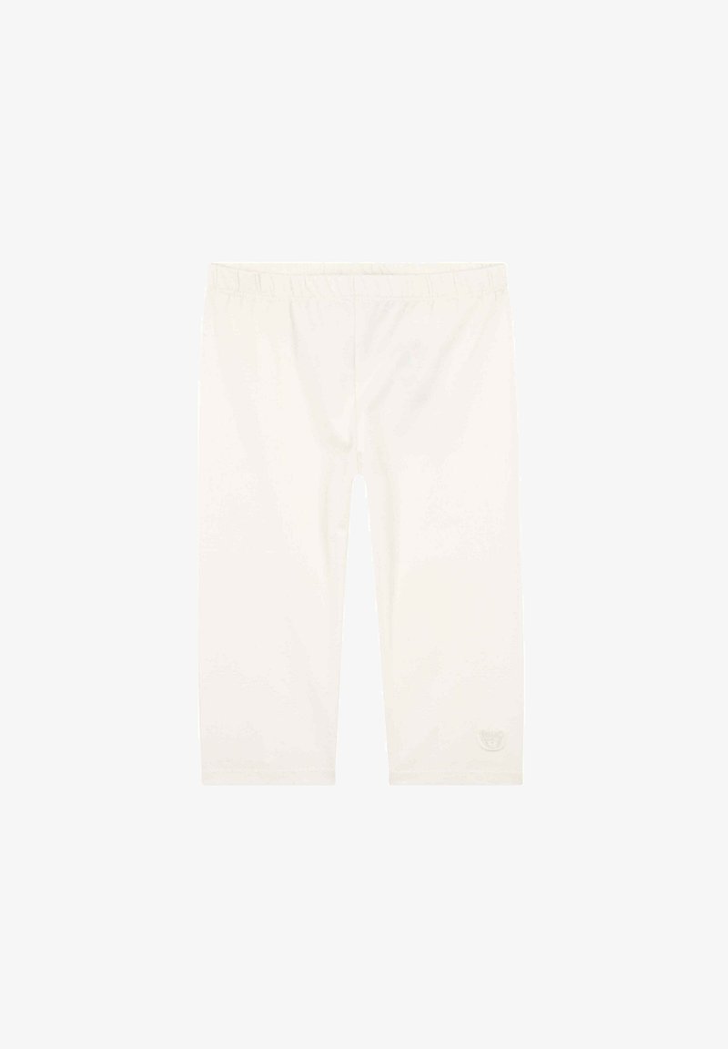 Collants blancs à taille élastique, longueur jusqu'aux genoux, avec un petit logo embossé près de l'ourlet inférieur sur la jambe gauche.