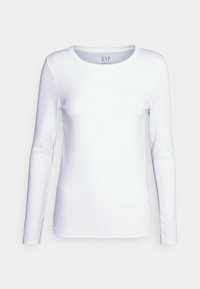 Langärmliges weißes Baumwoll-T-Shirt mit runder Ausschnitt, ausgestattet mit flachen Nähten und einem Etikett mit dem "GAP"-Logo, das sich zentral am Hals befindet.