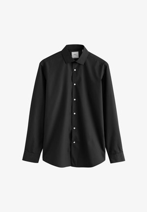Schwarzes Langarmhemd aus glattem Stoff mit spitzem Kragen, ausgestattet mit einer durchgehenden Knopfleiste und weißen Knöpfen zum Schließen.