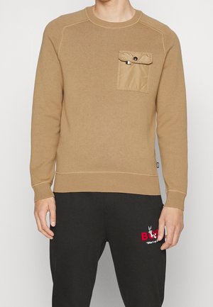 Stickad tröja - beige