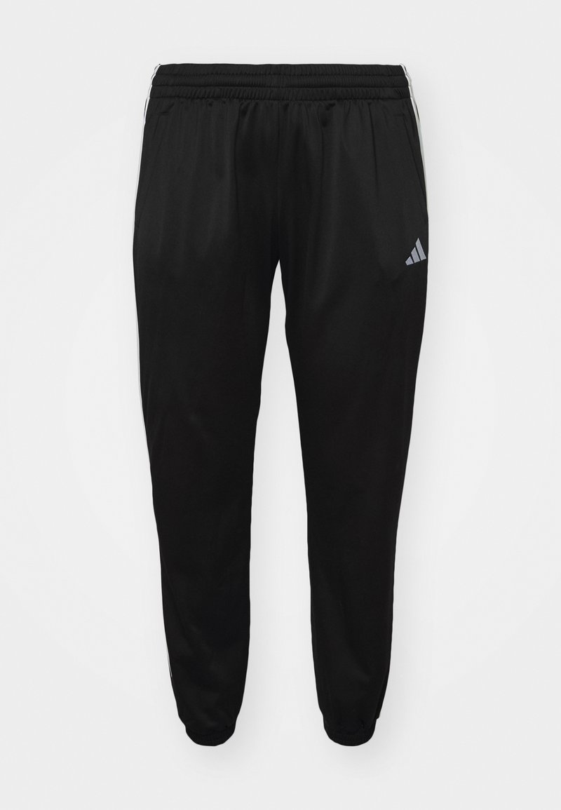 Černé sportovní tepláky s elastickým pasem, manžetami u kotníků, bočními kapsami a malým logem Adidas na pravém stehně.
