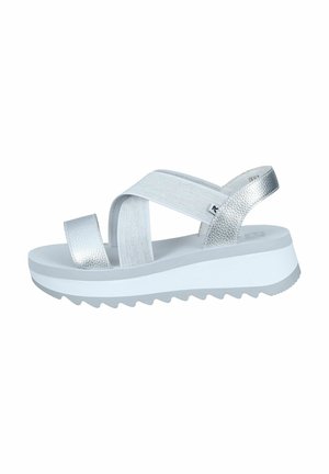 Sandales plateformes argentées avec des brides texturées, dotées d'une épaisse semelle blanche et d'un motif de semelle en zigzag. Comprenant deux brides croisées et une bride arrière.