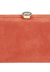 Coral suede clutch with a rectangular shape, gold hardware, and a circular black logo accent on the top closure. Soft texture.