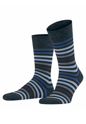 Gestreifte Socken in verschiedenen Schattierungen von Blau, Grau und Schwarz. Glatte Textur, Crew-Länge, mit verstärkter Ferse und Zehen.