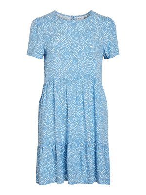 Blå kortermet kjole med rund hals og lagdelt volangnederdel. Har et prikket mønster i hvitt, laget av lett stoff.