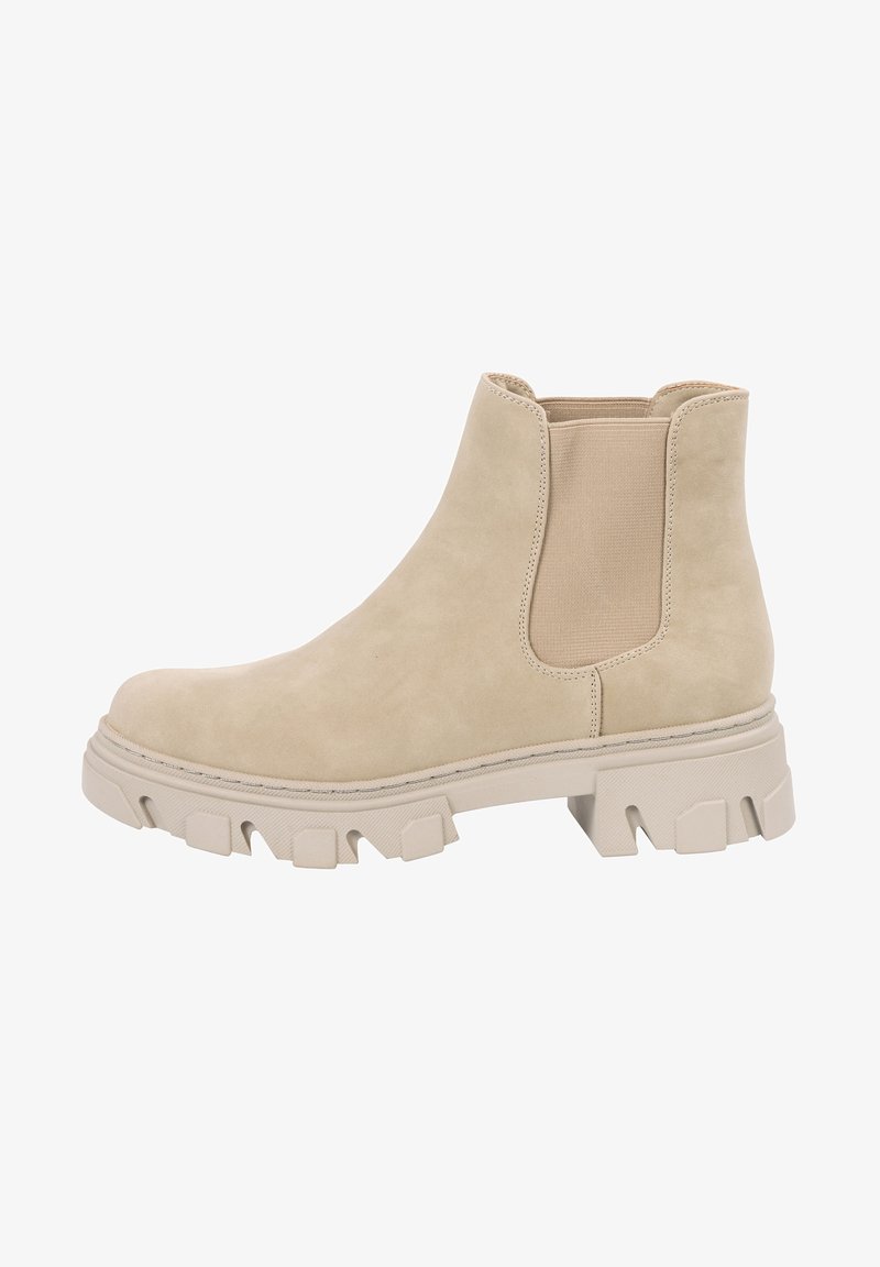 Bottine Chelsea en daim beige avec semelle en caoutchouc épaisse, panneau latéral élastique et bout rond, conçue pour un usage décontracté ou en extérieur.