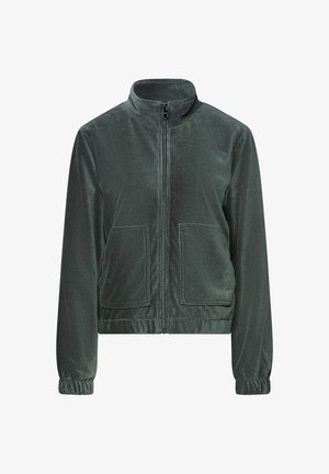 Dunkelgrüne Zip-Jacke aus weichem Cordstoff, mit Stehkragen, zwei vorderen Taschen und elastischen Bündchen.