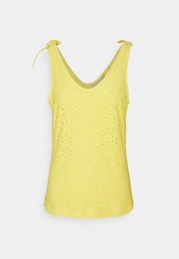 Gul ärmlös topp med V-ringning, som har ett texturerat mönster av diamantformer och små hål, med knytband vid axlarna.