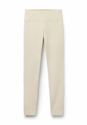 Beige leggings met een hoge, brede tailleband, gemaakt van een zachte, rekbare stof. Rechthuidig ontwerp zonder zichtbare naden of patronen.