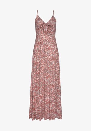 Robe longue à fleurs avec un nœud à l'avant, des bretelles fines et ajustables, et un tissu léger et fluide aux nuances de rouge, blanc et bleu.