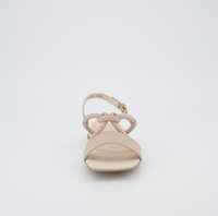 Sandalini rosa chiaro con una fascia flessibile, caratterizzati da un design annodato decorativo sul davanti, suola chiara e cinturino alla caviglia regolabile.