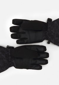 Black gloves with a textured leather palm and stretchy fabric cuffs. Camo pattern visible on the fabric, designed for warmth and grip.