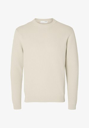 Maglione beige chiaro lavorato a maglia con scollo rotondo, maniche lunghe e polsini e orlo a coste. Dettaglio in tessuto strutturato che aggiunge interesse visivo.
