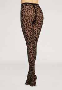 Gennemsigtige sorte strømpebukser med leopardmønster og høj talje. Stoffet er glat med en let gennemsigtig tekstur.