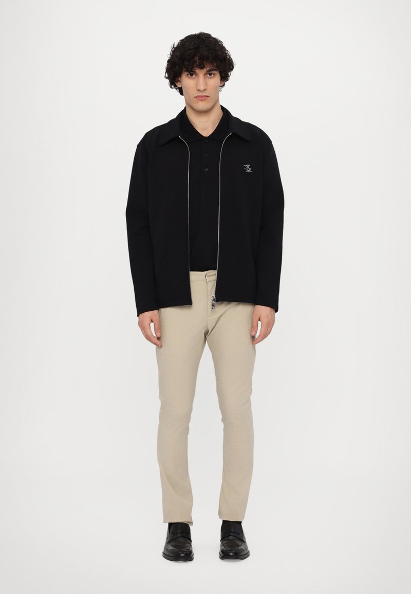 Filling Pieces UNISEX - Veste légère - black