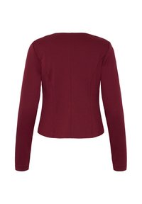 Vue arrière d'un blazer femme ajusté à manches longues de couleur rouge foncé avec des coutures structurées et sans fermetures visibles.