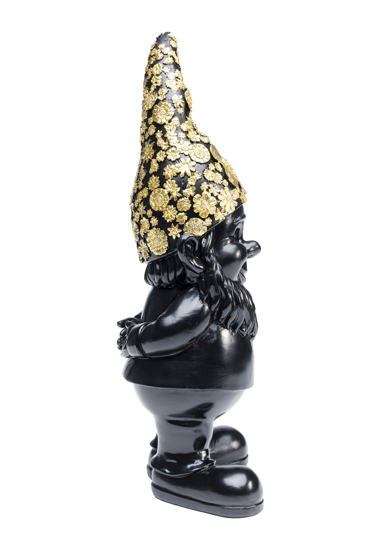 Figurine de gnome noir avec une finition brillante, portant un chapeau haut décoré d'un motif doré, présentant des accents floraux et un corps robuste et arrondi.