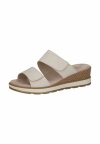 Sandali con zeppa, superiore in materiale sintetico beige, due fasce larghe e soletta imbottita. Accento testurizzato con motivo di sughero sul tacco a zeppa.