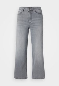 Grå denimjeans med lös passform, hög midja och vida ben. Har framfickor, knäppning och lätt blekning för en avslappnad look.