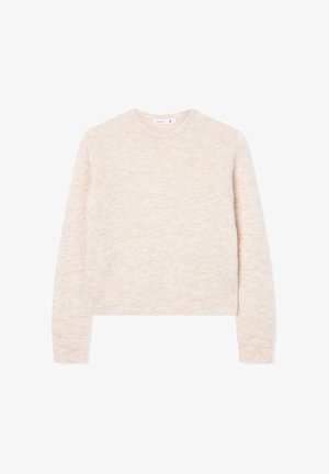 Jasno beżowy, krótkiego kroju sweter wykonany z miękkiej, teksturowanej tkaniny. Posiada długie rękawy oraz okrągły dekolt z prążkowanymi mankietami i dolną krawędzią.