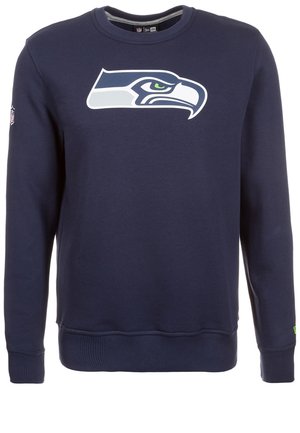 Marineblauer Sweatshirt aus Baumwolle mit gerippten Bündchen und Saum. Auf der Vorderseite befindet sich ein großes, weißes und grünes Logo der Seattle Seahawks.