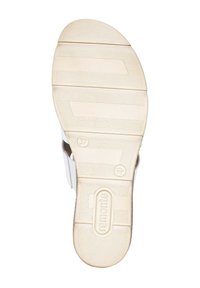 White sandal sole with textured rubber, featuring ridges for traction, marked size 37, and branding "remonte."