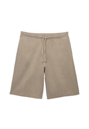 Beige athletic shorts made of soft fabric with an elastic waistband and adjustable drawstring; features side pockets and a loose fit.