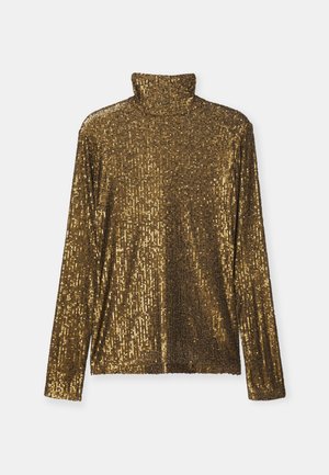 Guldpaljetterad polotröja med långa ärmar, en figurnära siluett och en mjuk textur med en glittrande, reflekterande yta.