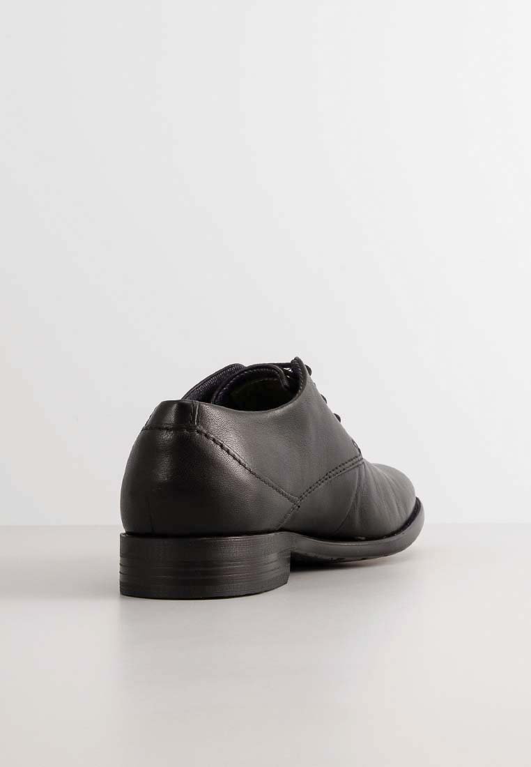 Schwarzer Lederschuh mit glatter Textur, abgerundeter Zehenpartie und niedrigem Absatz. Verfügt über einfache Nähte und ein Schnürdesign.