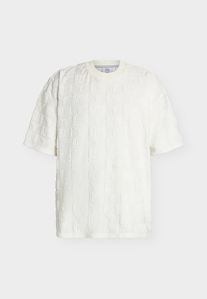 T-shirt bianca a maniche corte con motivo geometrico e astratto goffrato e testurizzato, scollo tondo e vestibilità comoda.