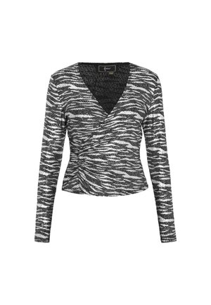 Top lung cu mâneci lungi, alb-negru, cu un model zebrat, material texturat, decolteu adânc în formă de V și talie ajustată.