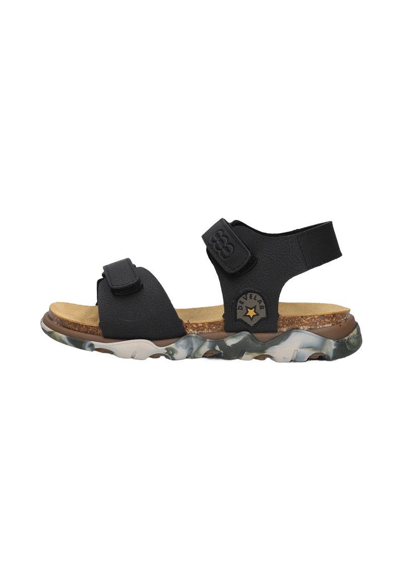 Black sandals with dual Velcro straps, cork footbed, and multicolored textured rubber sole. Features a logo on the outer side.