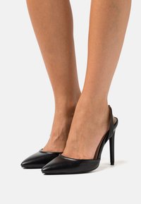 RAID Wide Fit CLEMENTINE - Saltos clássicos - black