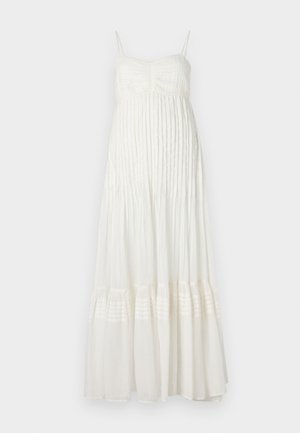 Vestido maxi blanco con tirantes finos, cuerpo fruncido texturizado y falda suavemente fruncida con rayas horizontales en el dobladillo. Tela ligera.