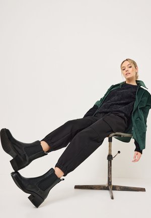 Ankle boots - black leather