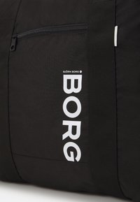 Björn Borg CORE TOTE - Saco de desporto - black beauty
