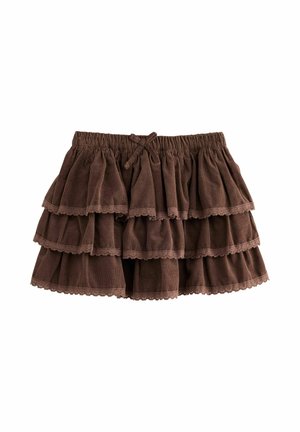 Bruine gelaagde corduroy rok met elastische tailleband en een klein strikje aan de voorkant, met drie rucheslagen met kanten rand.