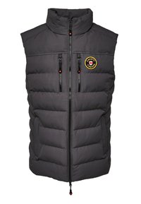 Opgevuld zwart vest met hoge kraag; twee rits borstzakken en zijzakken. Bevat een logosticker aan de linkerzijde.