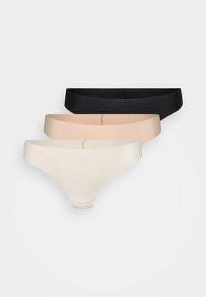 Three thong panties in black, light pink, and off-white. Smooth fabric with a seamless design and thin waistbands for minimal visibility.