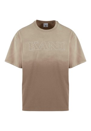 Beige cotton t-shirt featuring a gradient design from light to dark, with white "KANI" embroidery across the chest. Short sleeves and crew neck.