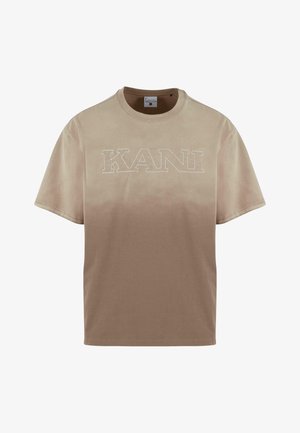 Bež majica iz bombaža z gradientnim dizajnom od svetle do temne, s belim vezenjem "KANI" čez prsi. Kratke rokave in krožni ovratnik.