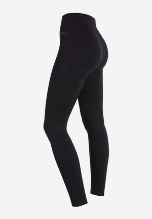 Mustat legginsit korkealla vyötäröllä, valmistettu sileästä, joustavasta kankaasta. Ominaisuuksiin kuuluu saumaton muotoilu ja teksturoitu korostus sivuilla.