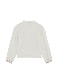 Bílá halenka s dlouhými nafouklými rukávy a růžově vyšívanými manžetami. Látka má měkký, texturovaný povrch a kulatý výstřih.