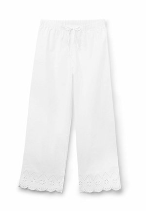 Bílé volné kalhoty s elastickým pasem a stahovací šňůrkou, s krajkovým lemováním s květinovými výřezy na spodním okraji.