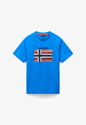 Blue cotton t-shirt featuring a central Norwegian flag graphic, black and red accents, and "NAPAPIJRI" text above and below the design.