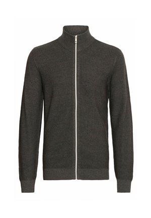 Mørkegrå lynlås cardigan med høj krave, ribbet tekstur og lange ærmer, med en kontrasterende hvid lynlås. Minimalistisk design.