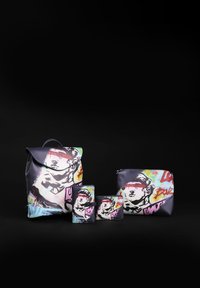 Three accessory bags featuring a colorful graffiti design, primarily in shades of purple, with notable figures and graphic patterns.