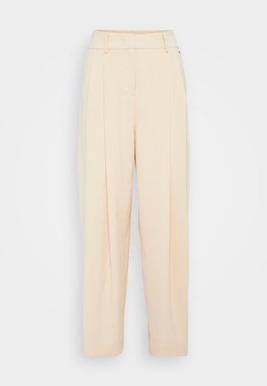 Pantalons larges beige clair à taille haute, dotés de deux poches avant et de faux plis pour plus de détails. Tissu lisse et doux.
