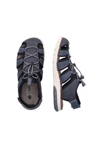 Sandales bleu marine au design ouvert, tige en synthétique, lacets élastiques et semelle en caoutchouc blanc avec accents texturés et sangle réglable.